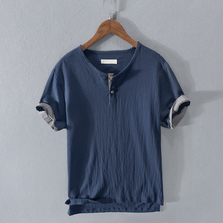 Dark blue men's relaxed fit henley, ideal comfortable short sleeve casual wear for summer.