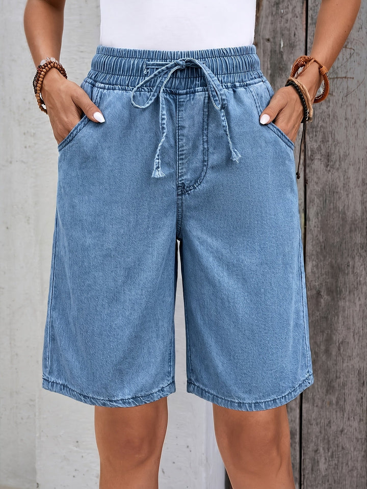 Light blue women's bermuda shorts with drawstring waist for casual comfort and relaxed summer style.