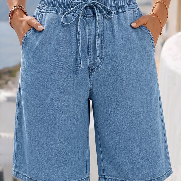 Chic light blue bermuda shorts for women, providing effortless comfort with a wide-leg design for summer style.