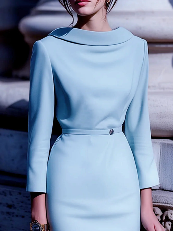 Stylish light blue women's midi dress with a chic turn-down collar, V-back design, and elegant mid sleeves.