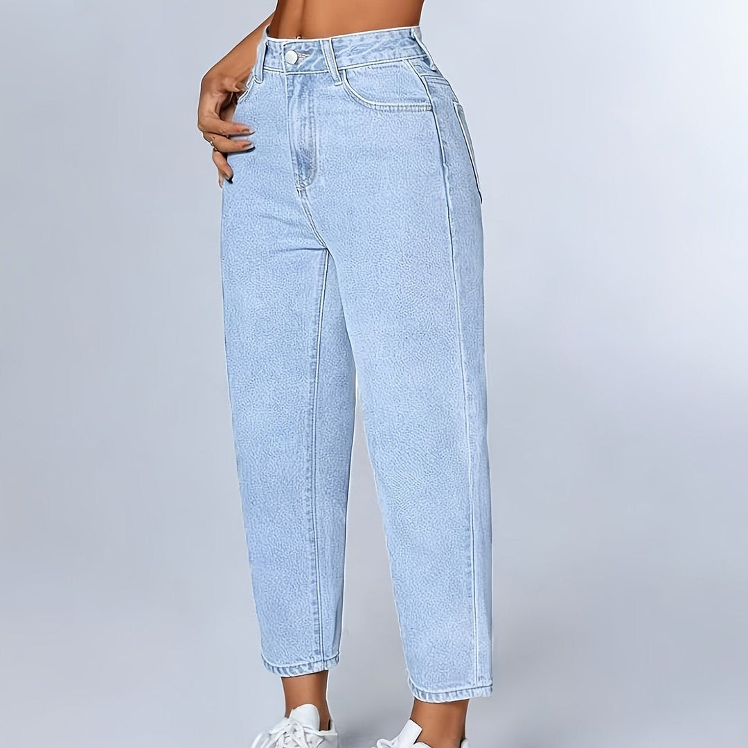 Women's light blue tapered mom jeans with cuffed hem. High waist, relaxed fit, ideal for casual fashion.