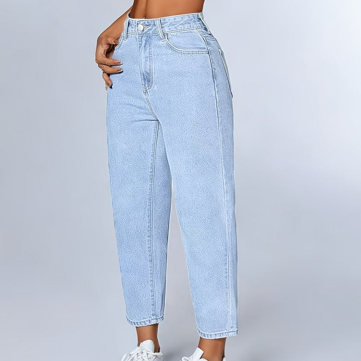 Women's light blue tapered mom jeans with cuffed hem. High waist, relaxed fit, ideal for casual fashion.