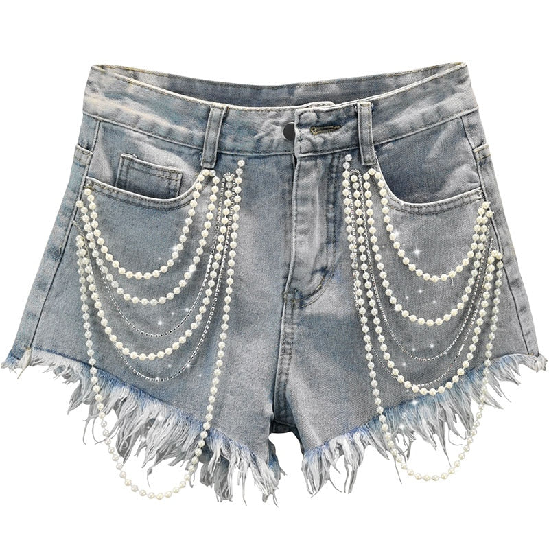 Light blue women's pearl tassel shorts for a chic summer look. Trendy high-waisted denim for vacation wear.
