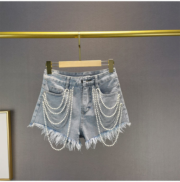 Stylish light blue denim pearl tassel shorts for women, perfect for casual summer fashion & vacation outfits.