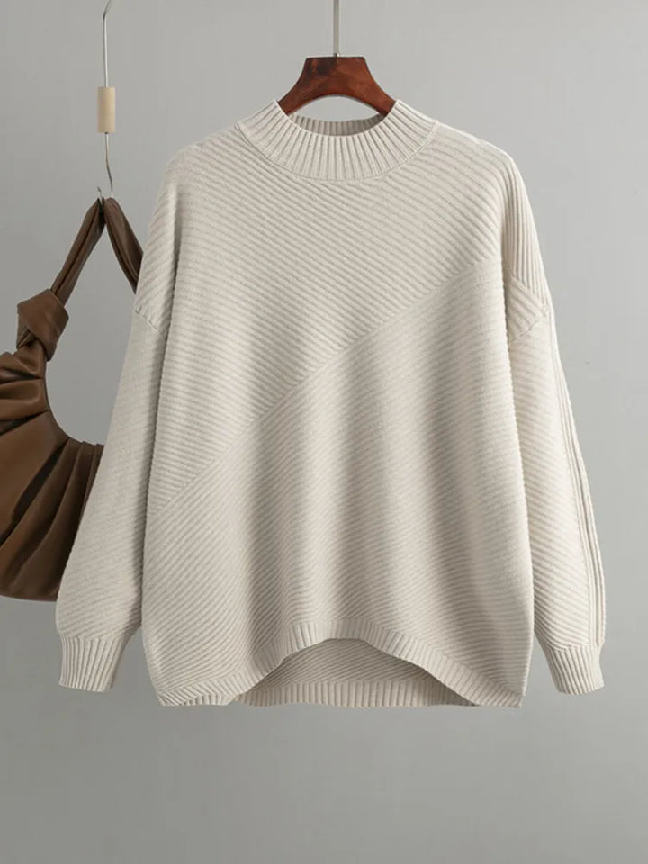 Apricot oversized ribbed knit women's sweater. Round neck, classic and comfortable casual top.