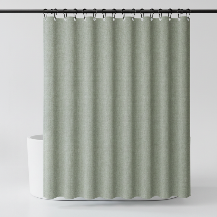 Wrinkle-resistant light green polyester shower curtain, water repellent and machine washable home decor.