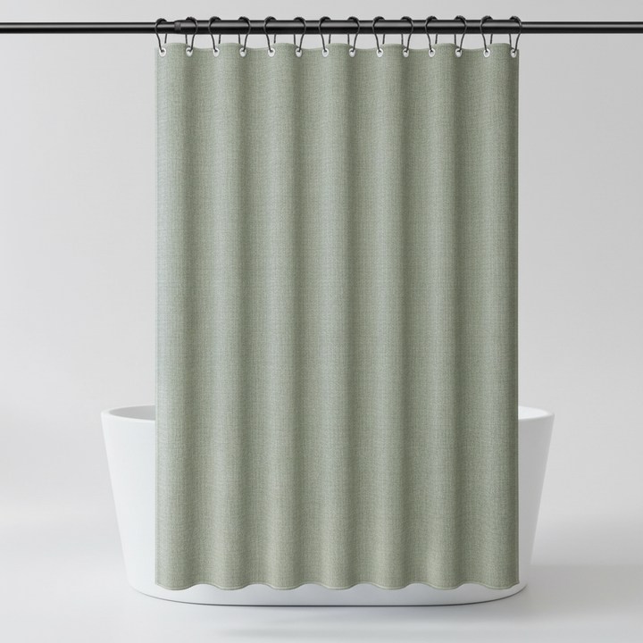 Elegant light green polyester shower curtain, durable and water repellent, ideal for spa-like bathroom decor.