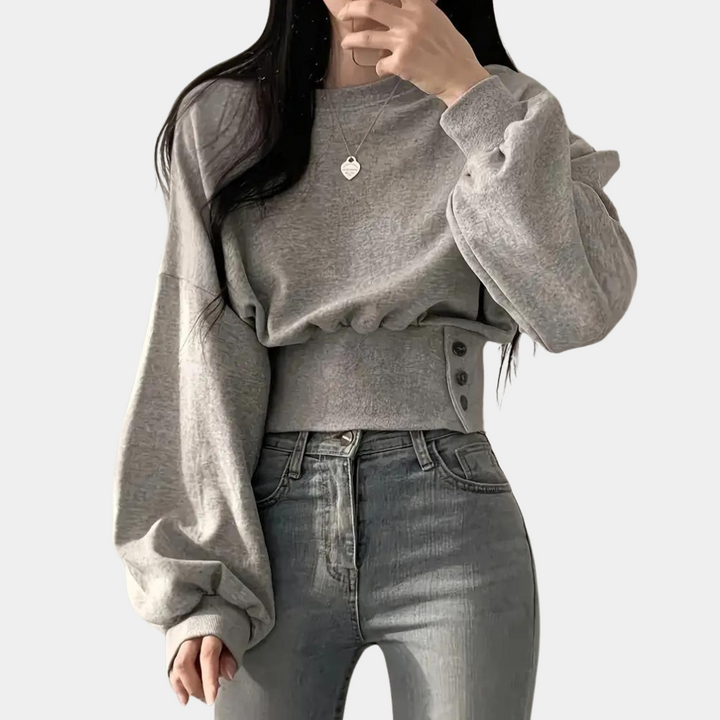 Versatile light gray loose fit sweater for women, perfect for comfortable everyday style & relaxed chic looks.