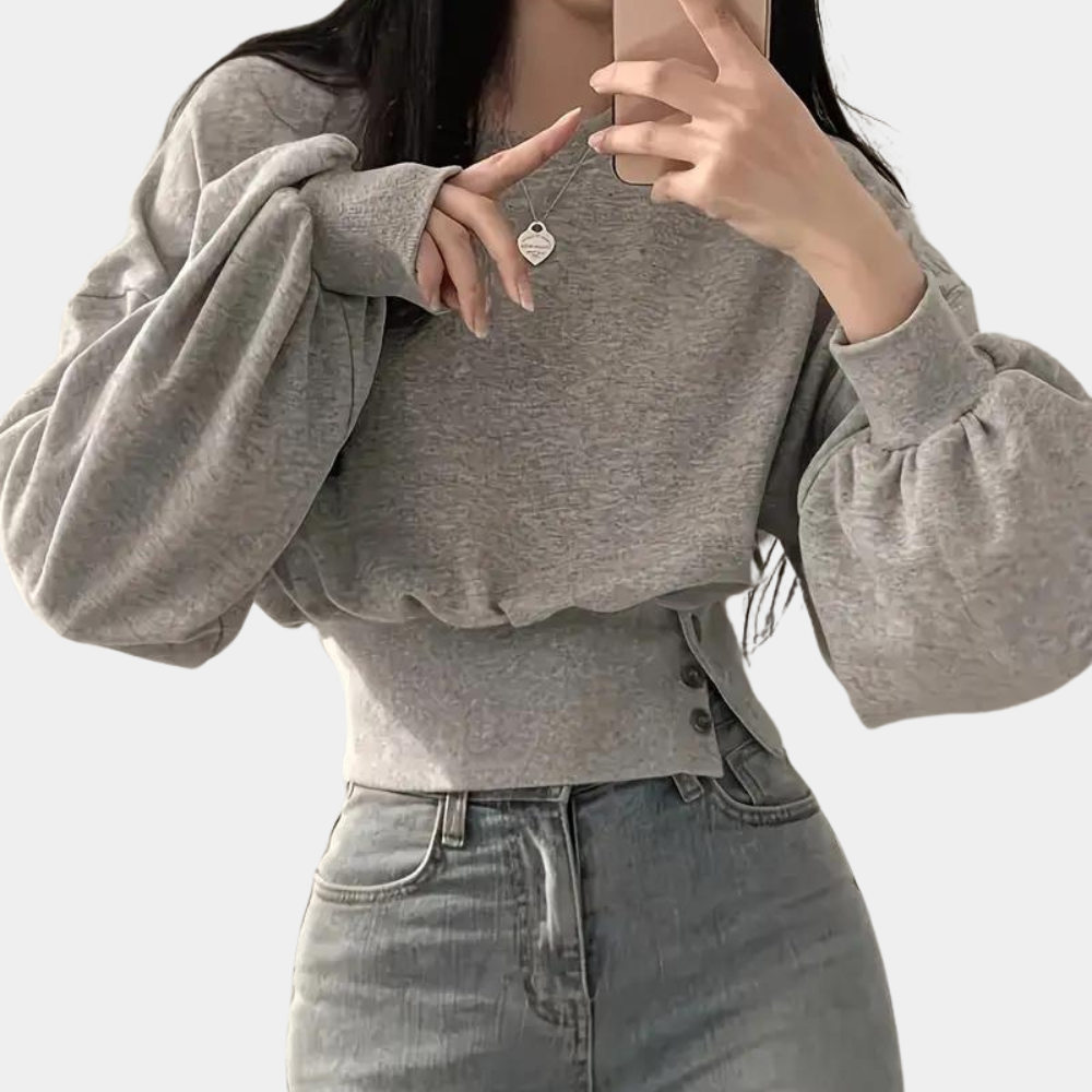 Gray women's loose fit sweater, comfortable and casual for everyday wear. Cozy, chic, and relaxed style.
