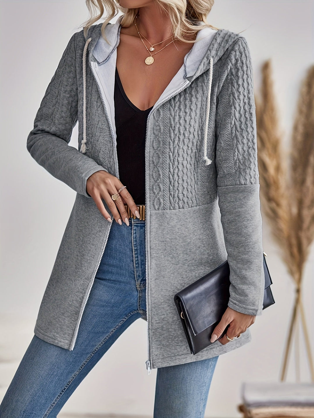 Light grey women's versatile textured hooded jacket. A casual zip-up perfect for spring, autumn, and everyday wear.