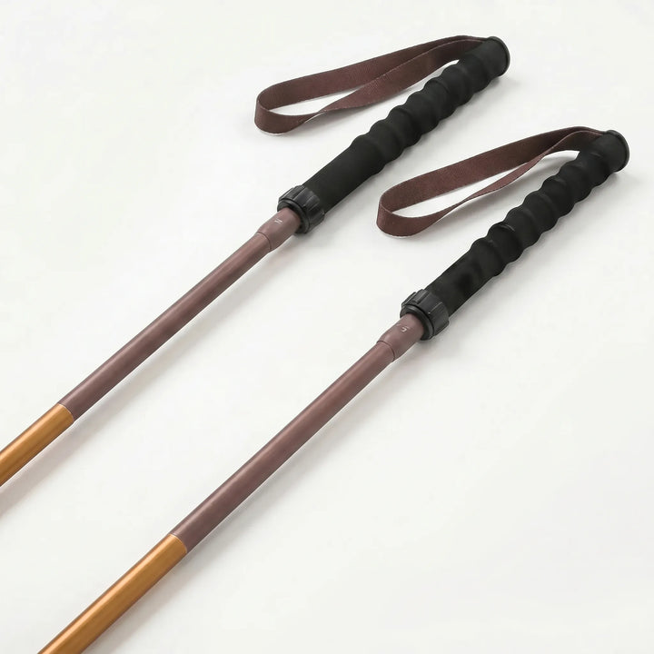 Portable folding hiking trekking pole with quick-lock, ideal for outdoor walking, trail running, & adventure gear.