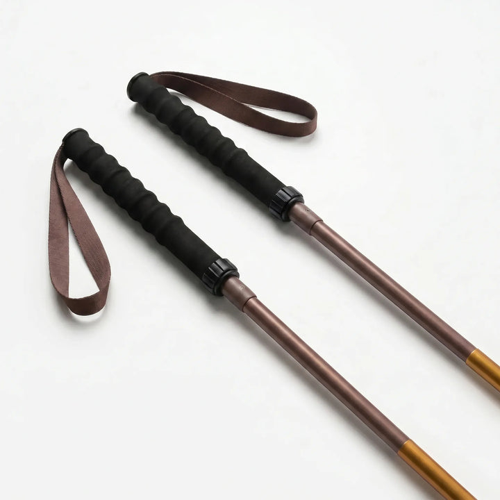 Folding quick-lock trekking pole, lightweight hiking gear for trail running, outdoor walking, & adventure.