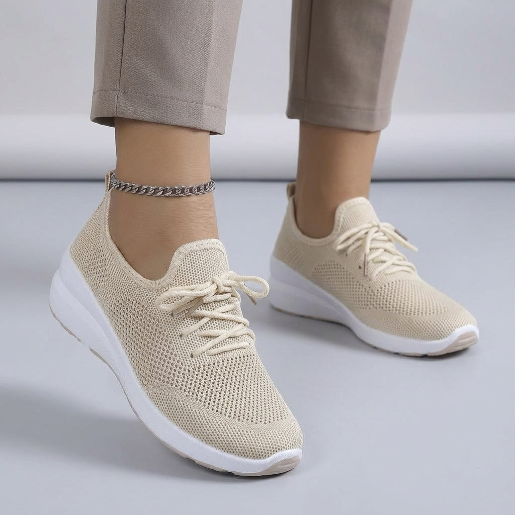 Side view of a women's everyday sneaker with a flexible sole, ideal for walking and casual wear.