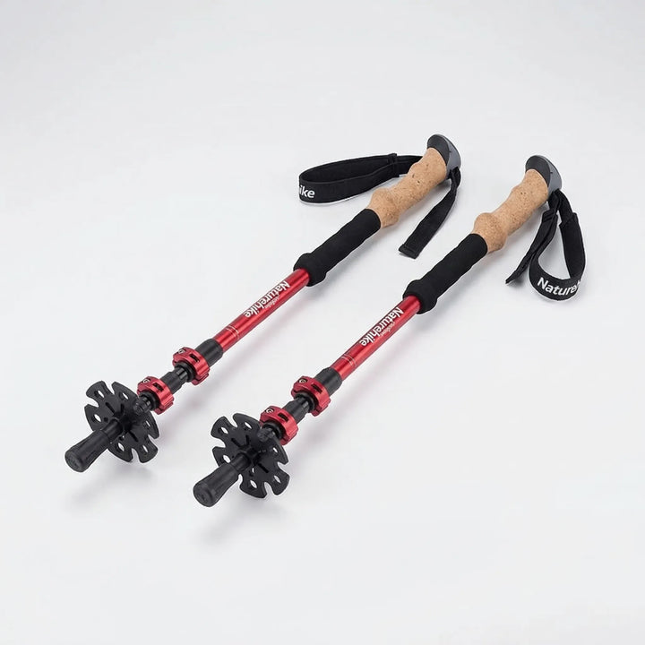 Adjustable carbon fiber hiking poles offering stable all-terrain support for hikers & outdoor enthusiasts.