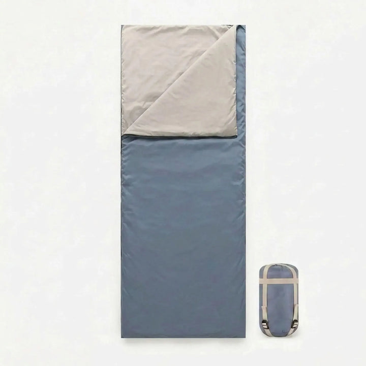 Unisex brown envelope sleeping bag, perfect for lightweight backpacking, travel, and outdoor adventures.