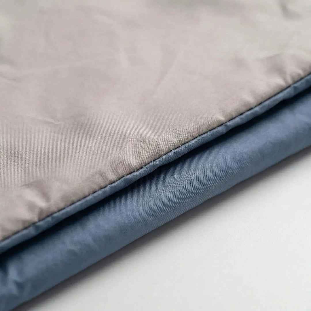 Compact & portable brown sleeping bag, designed for warm weather camping and hiking trips.