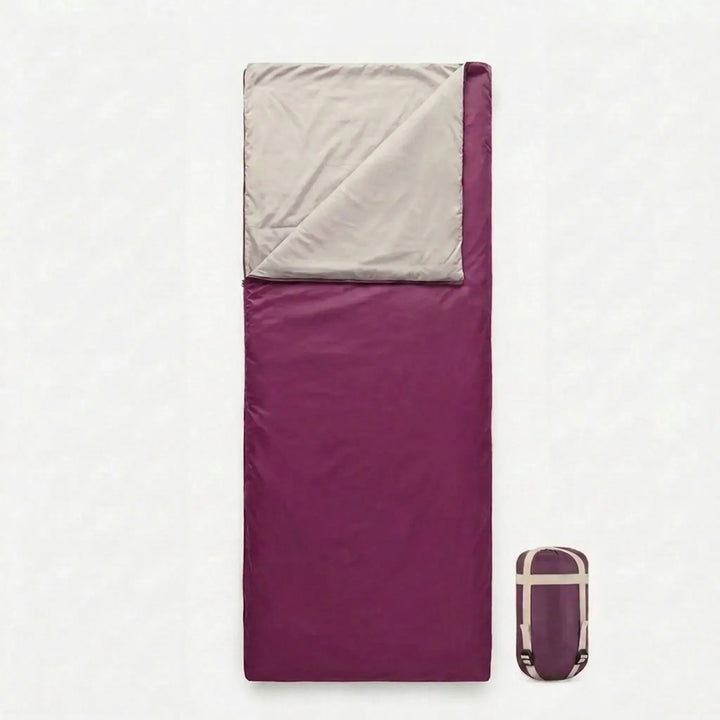 Open brown envelope sleeping bag, highlighting its spacious yet lightweight build for campers.