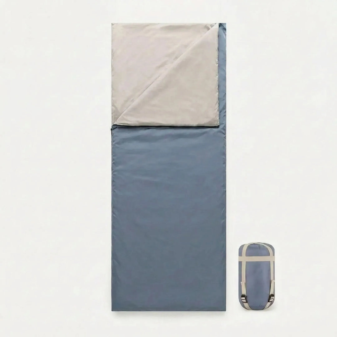 Outdoor-ready brown sleeping bag, ultra-light and compact for hiking, travel, and summer camping.