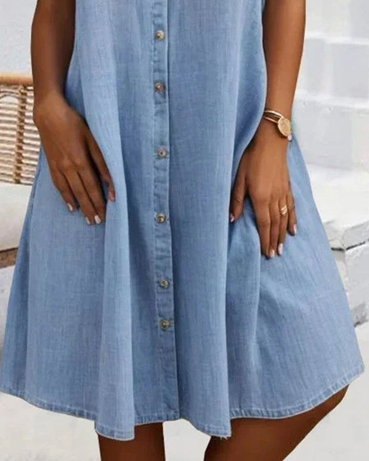 Blue denim-look shirt dress for women. Lightweight, comfortable, and a versatile casual choice for spring/summer.