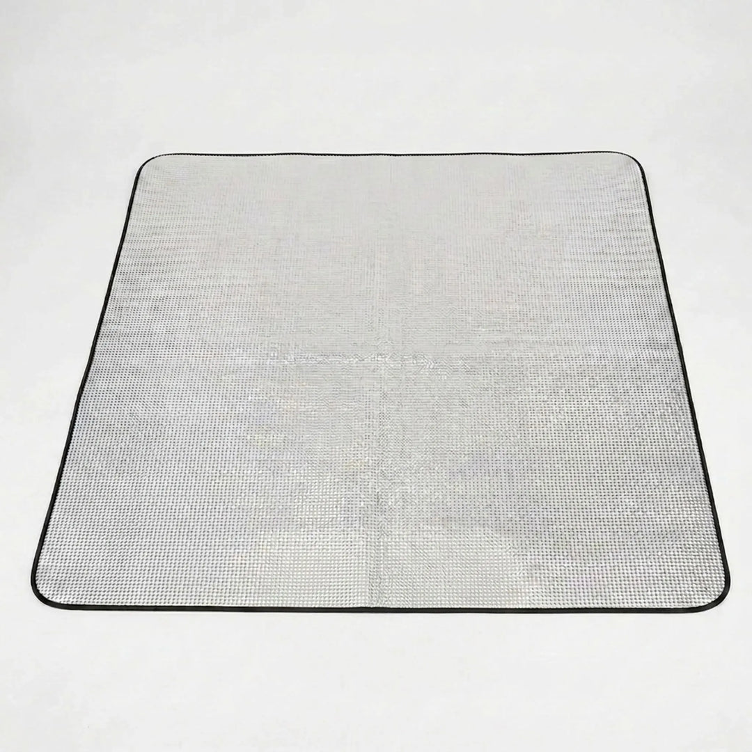 Reflective, foldable camping mat for outdoor comfort & insulation. Lightweight sleeping pad for hiking & picnic.