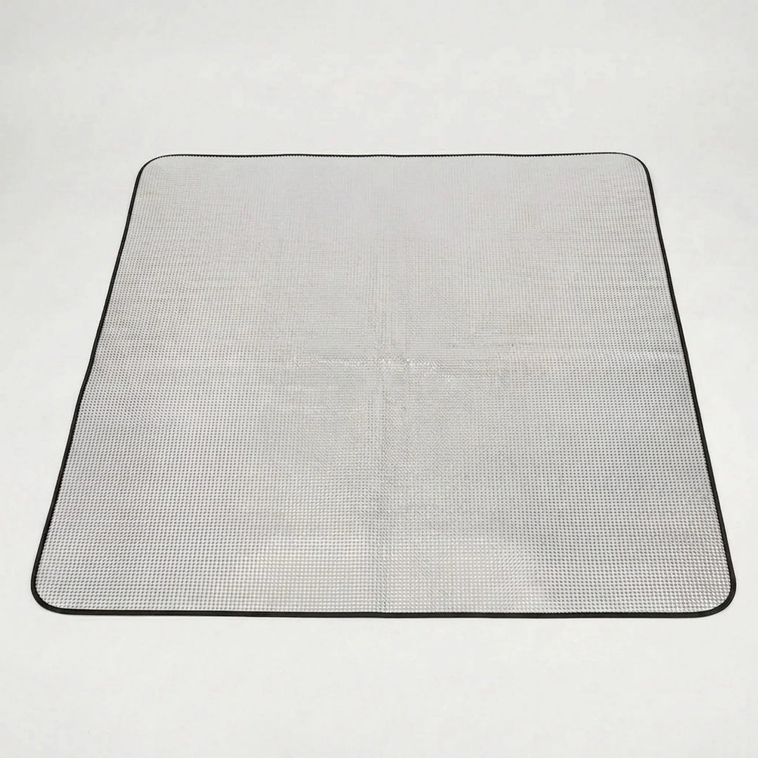 Foldable camping mat providing lightweight comfort for outdoor adventures, hiking trips, and easy travel sleep.