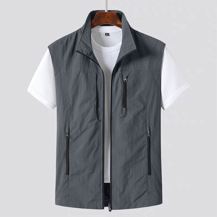 Men's multi-pocket utility vest, perfect for spring and summer travel, casual outings & outdoor adventures.