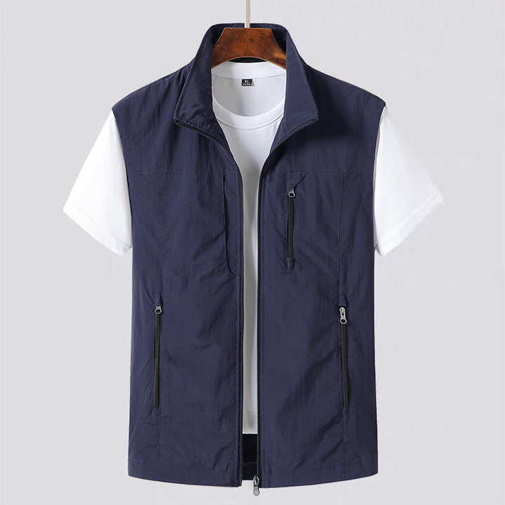 Breathable men's summer vest with secure multi-pockets, perfect lightweight outerwear for comfort & utility.