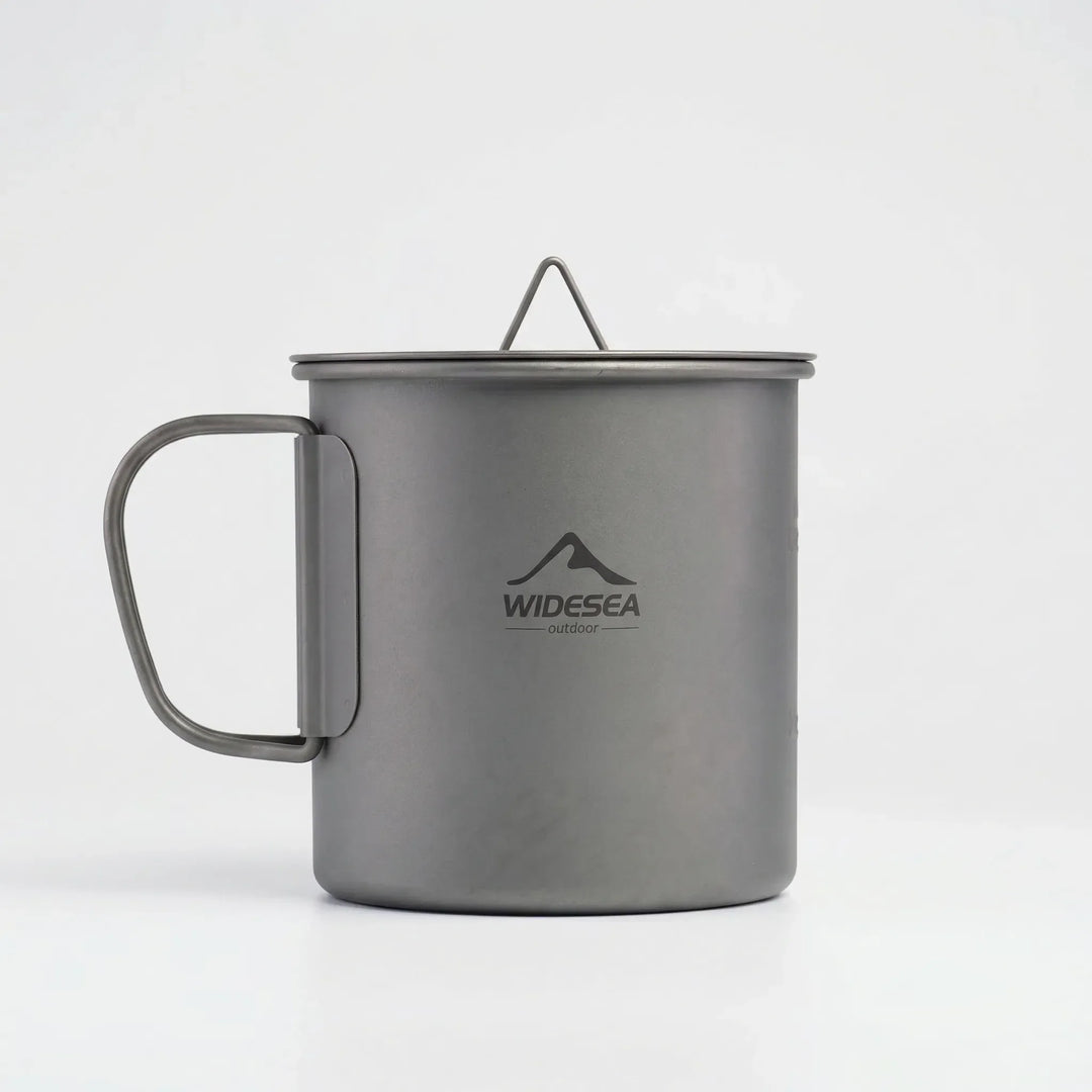 Enjoy your coffee anywhere with this compact foldable handle titanium outdoor camping mug, great for hiking.