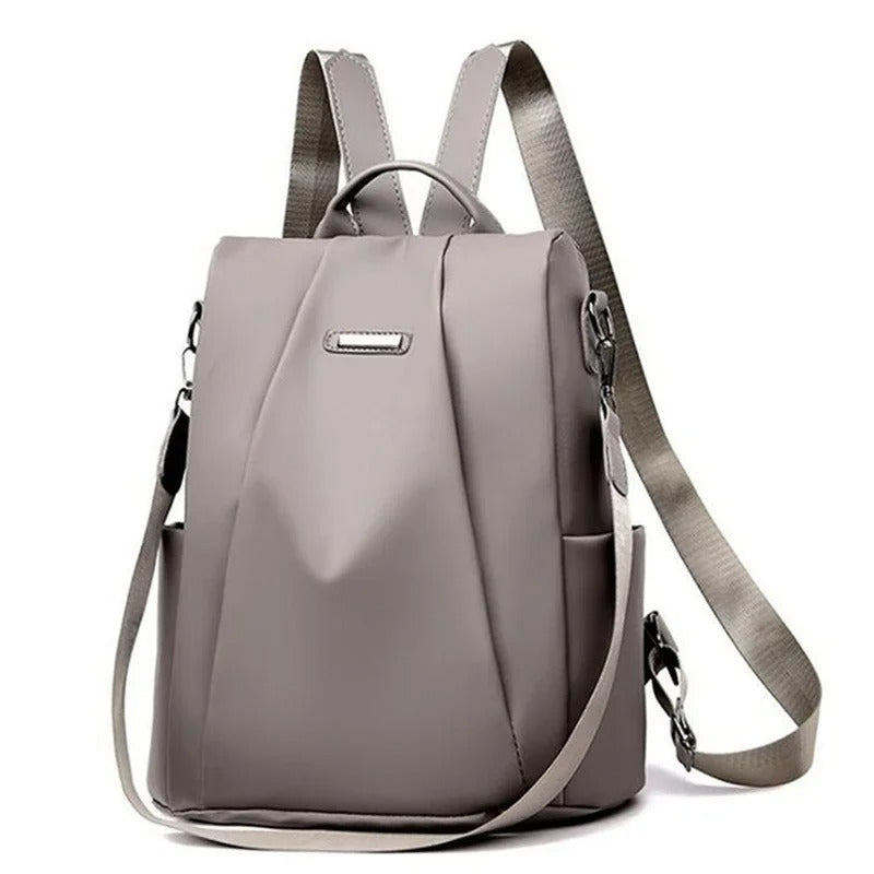 Stylish multi-way women's backpack made of water-resistant nylon, perfect for travel and everyday carry
