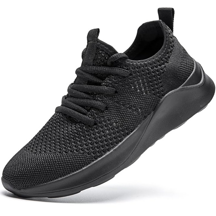 Detail of the sole of a women's lightweight athletic sneaker, showcasing grip