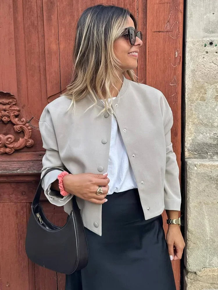 Casual chic women's bomber jacket, polyester fabric, lightweight with a trendy stand collar design.