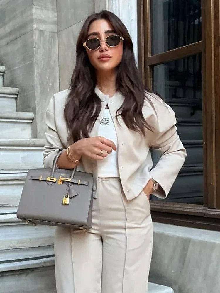 Summer outerwear: women's lightweight bomber jacket, casual elegant with a modern stand collar.