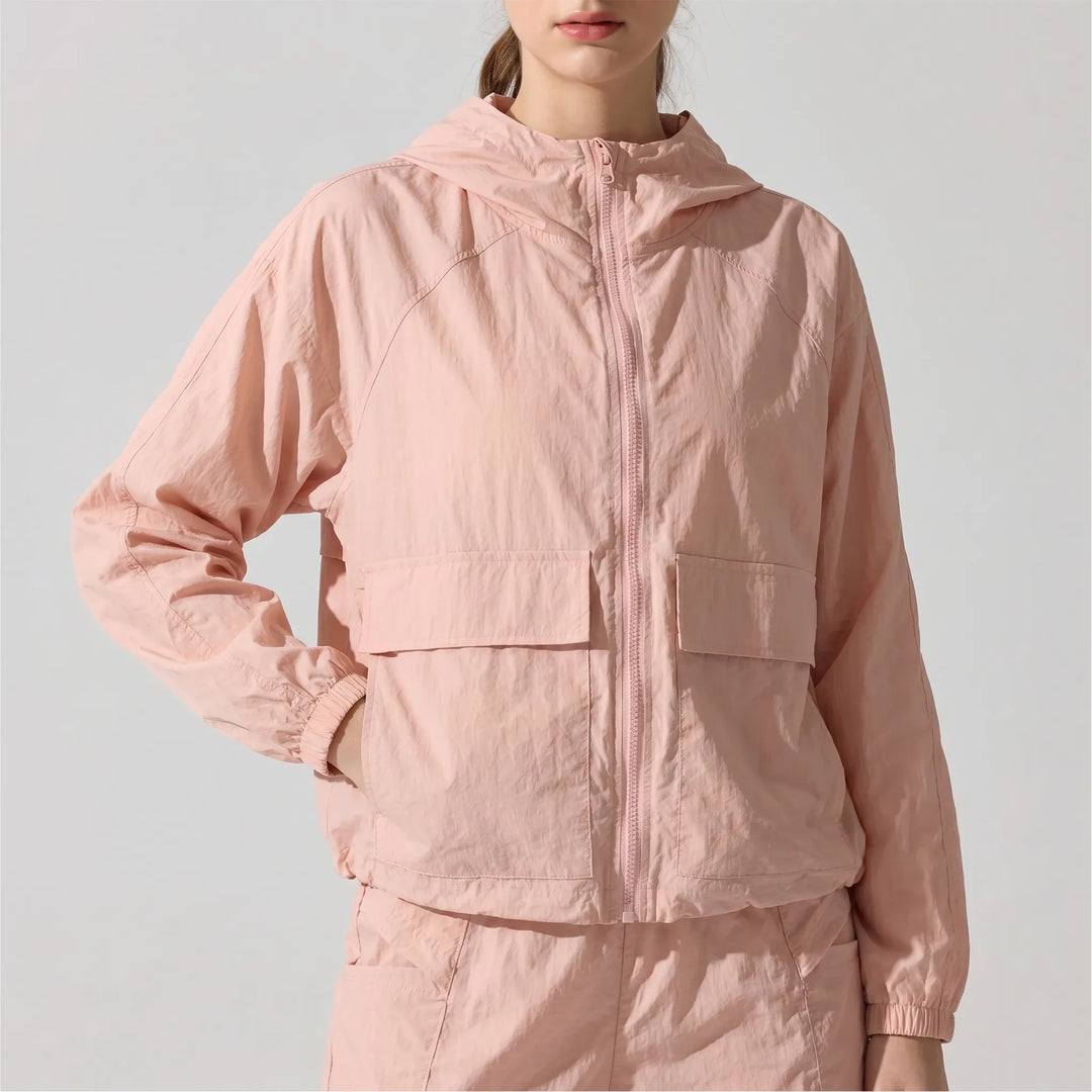 Spring/fall women's windbreaker jacket with hood, ideal for active outdoor movement & comfort.