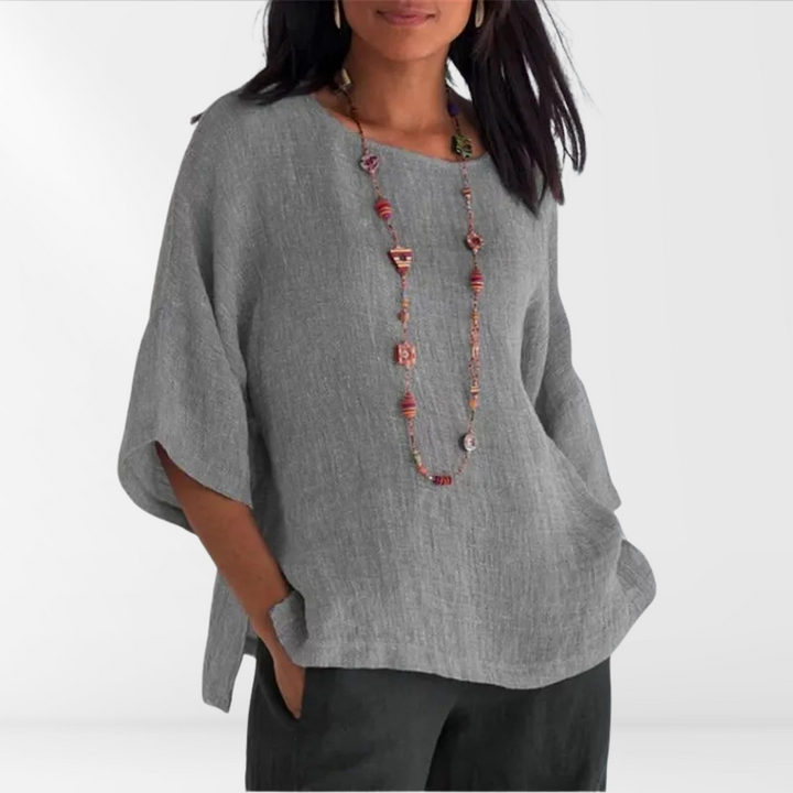 Lightweight women's long sleeve shirt, breathable for summer. Relaxed fit casual top, perfect everyday comfort.