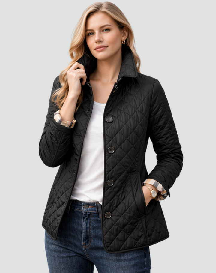 Lightweight women's quilted jacket with structured collar & button front. Perfect fall/spring outerwear.