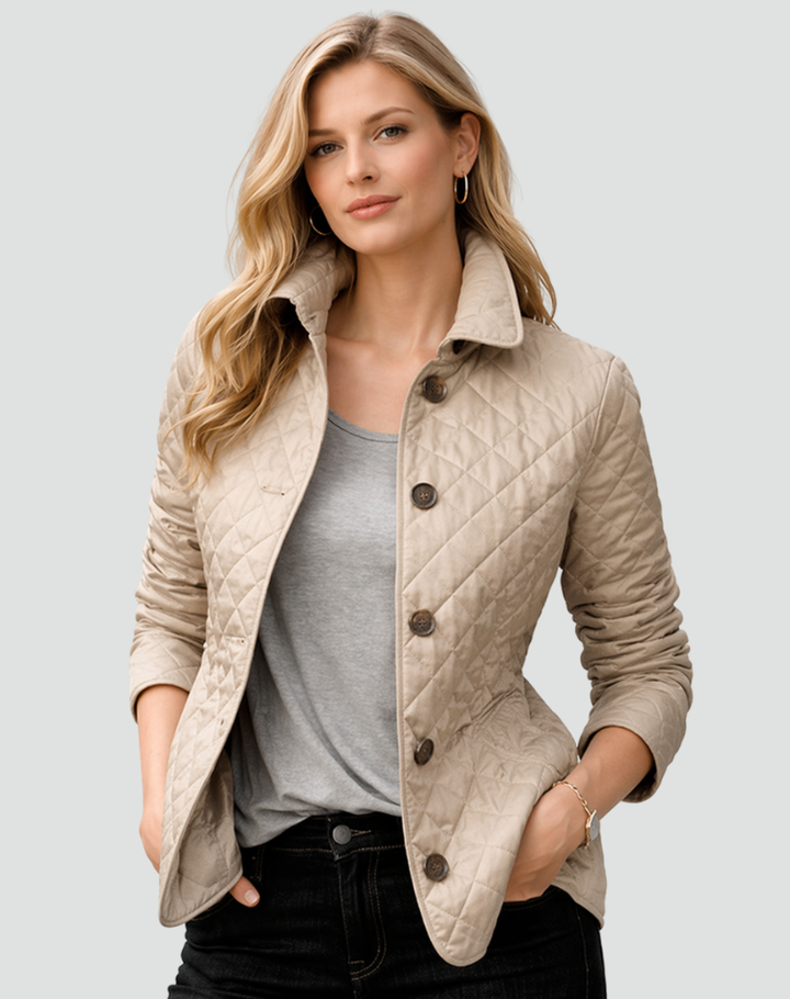 Cozy lightweight quilted jacket for women. Structured collar, button front. Ideal fall/spring layering piece.