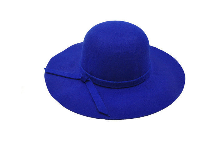 Women's summer bucket hat in a neutral grey, providing sun protection and a chic, casual vibe