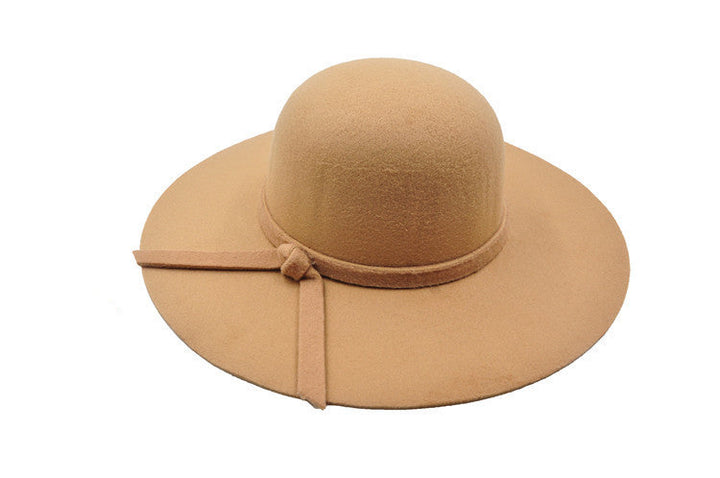 Stylish black women's bucket hat, perfect for summer, offering sun protection and a casual look