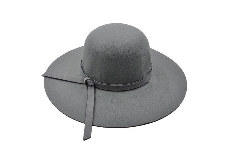 Woman wearing a fashionable lightweight summer bucket hat, demonstrating casual style