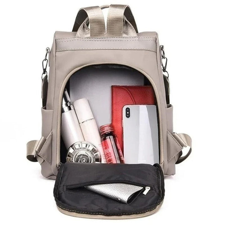 Minimalist style women's lightweight water-resistant backpack. Perfect ladies' bag for daily essentials & travel.