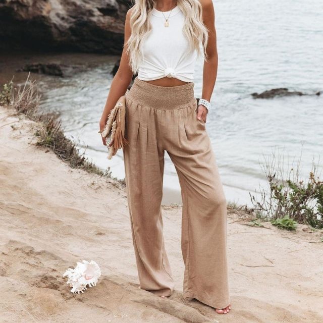 Summer pants: women's wide-leg linen blend trousers in a vibrant hue, designed for effortless elegance.