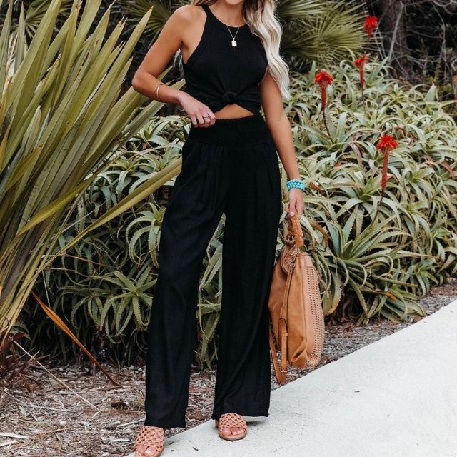 Women's apparel: relaxed fit wide-leg linen blend trousers, offering ultimate comfort and breathability.
