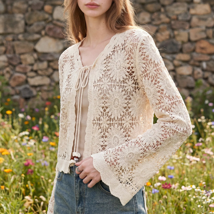 Lilac women's floral openwork cardigan with tie front and bell sleeves. Lightweight, high-hip summer layer for boho style.