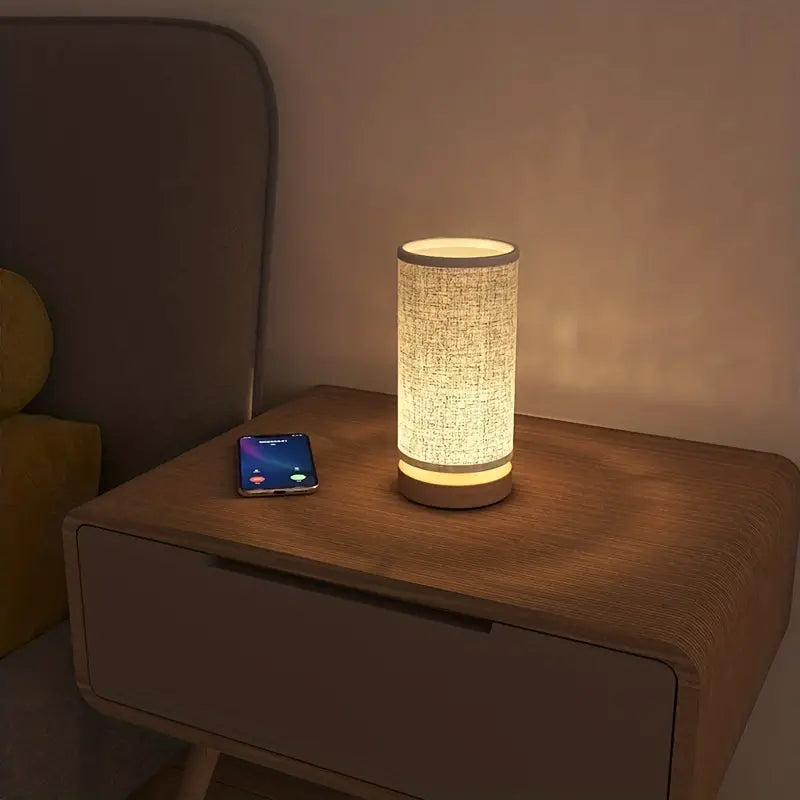 Decorative linen look LinoGlow bedside lamp, perfect for cozy bedroom lighting & modern home decor.