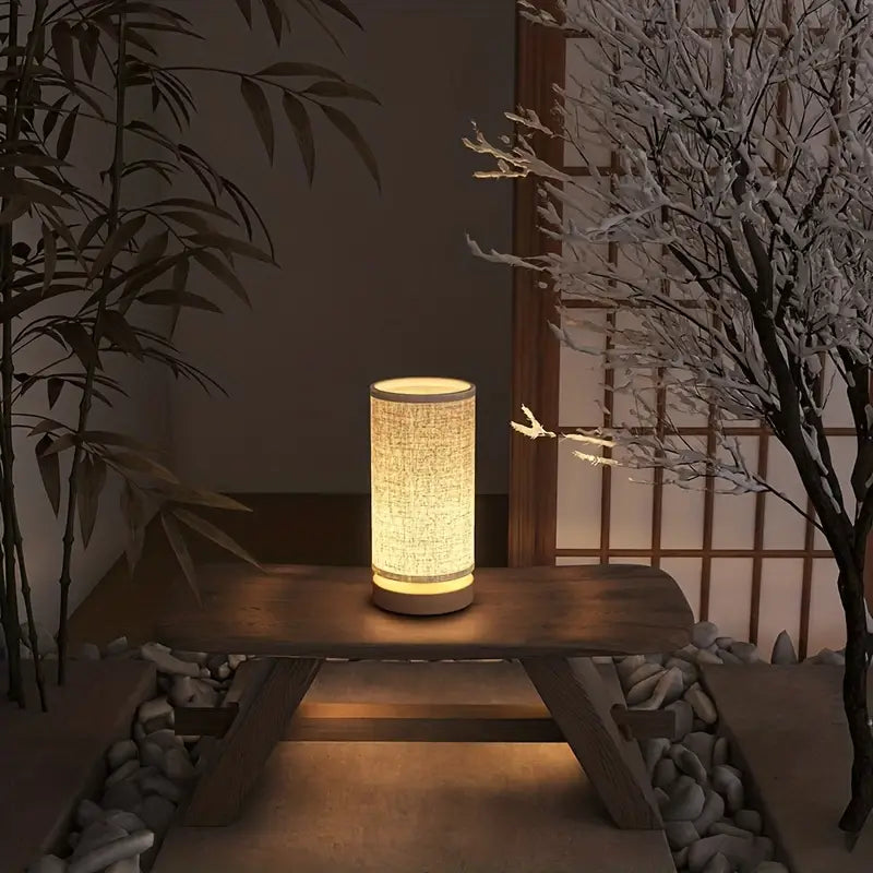 Modern linen look LinoGlow night light providing warm ambient lighting for a cozy & stylish bedroom.