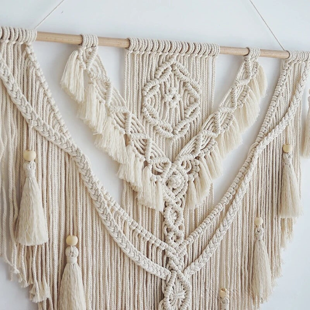 Bohemian Macramé Wall Hanging by Liora. Unique Scandinavian design, adds texture & natural elegance to walls.