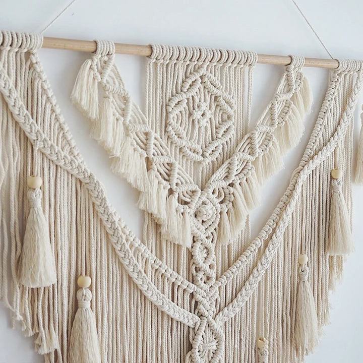 Bohemian Macramé Wall Hanging by Liora. Unique Scandinavian design, adds texture & natural elegance to walls.
