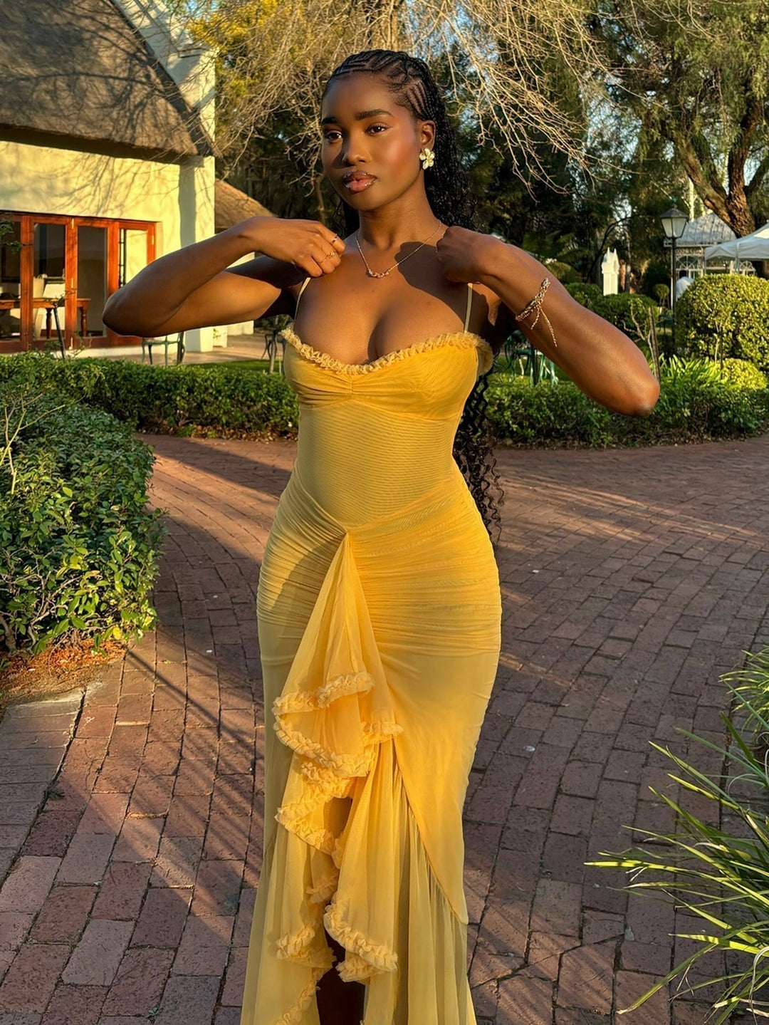 Sophisticated women's beach maxi dress with elegant ruffles and spaghetti straps