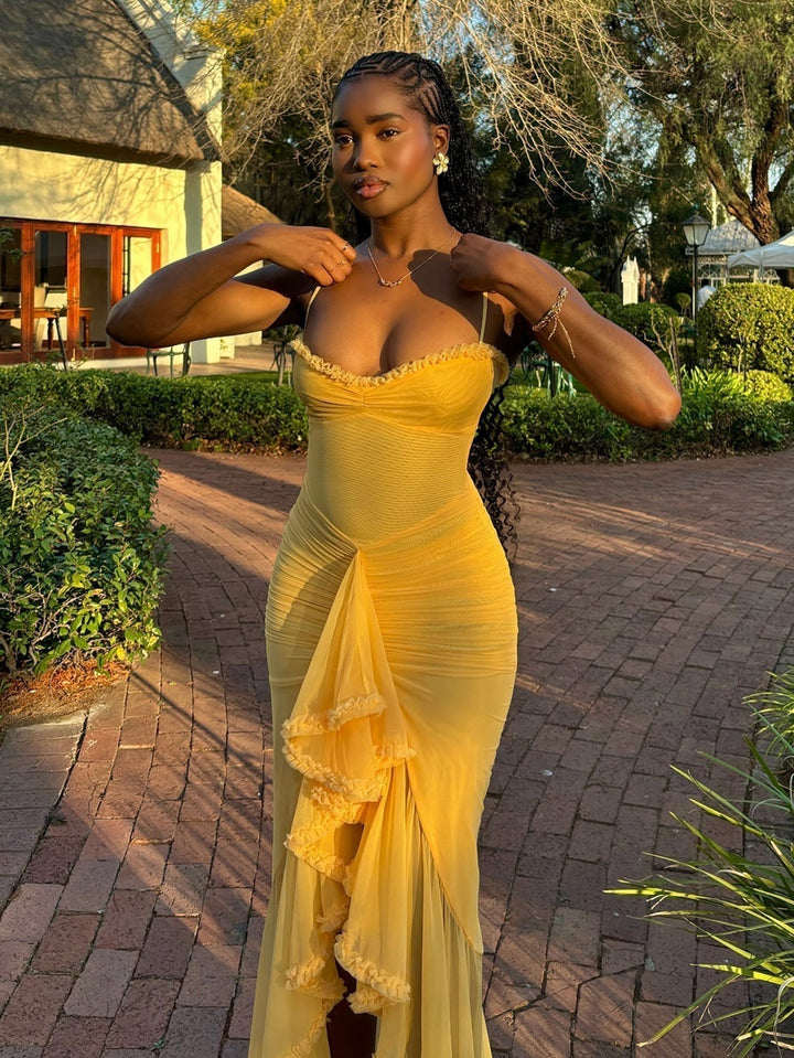 Sophisticated women's beach maxi dress with elegant ruffles and spaghetti straps