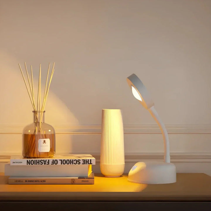 Compact LumaFlex wireless spotlight, motion-activated, providing versatile indoor lighting solutions.